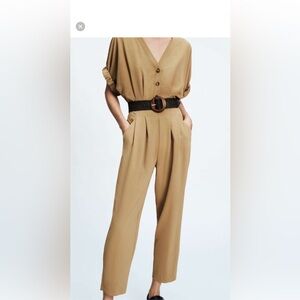 Zara tan jumpsuit size small with self tie and elastic waist.